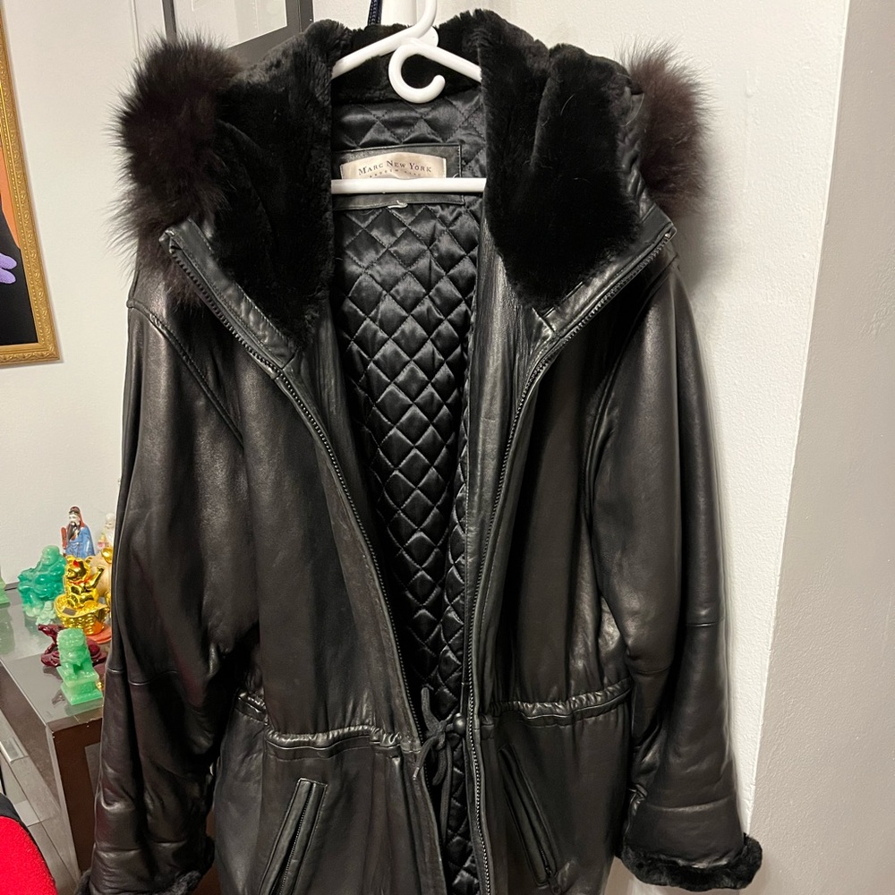 Andrew Marc leather three quarter length winter coat.